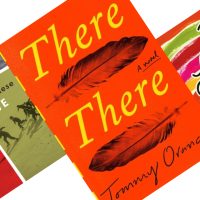 Three angeled brighly colored book covers with the center red and yellow cover with feathers and the title There There