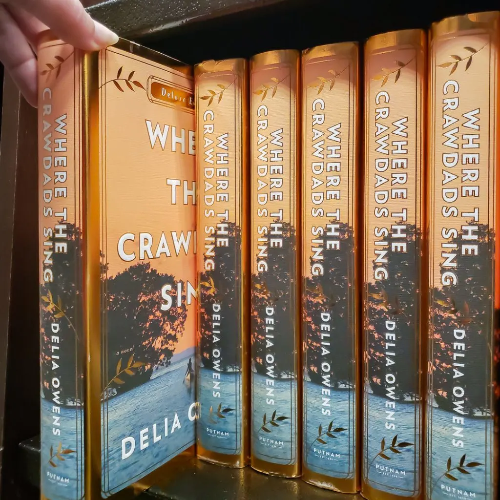 6 copies of Where the Crawdads Sing on a store bookshelf