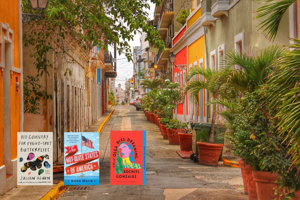 Photo of a colorful street in old San Juan, Puerto Rico with three covers of books set in the US Territories
