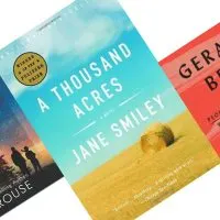 Three tilted book covers with A Thousand Acres in the center