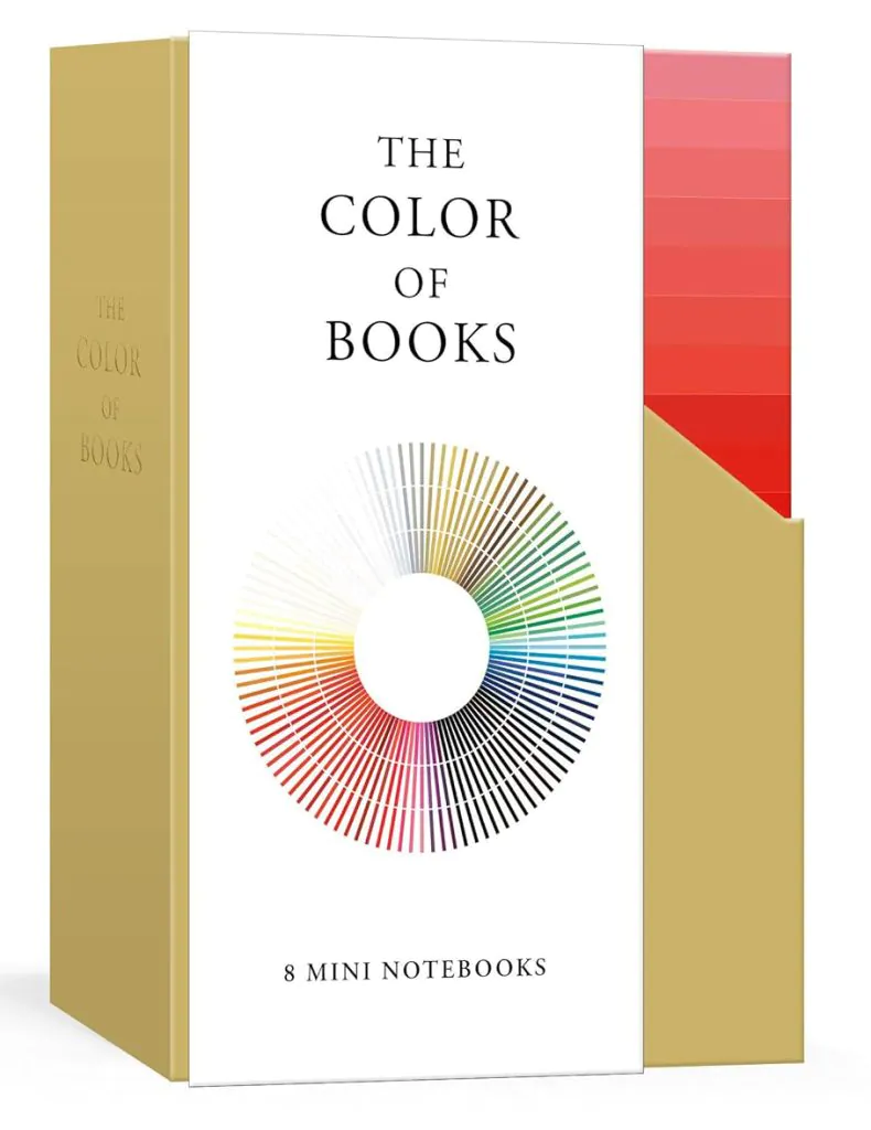Rainbow colored notebooks with book recommendations on the covers