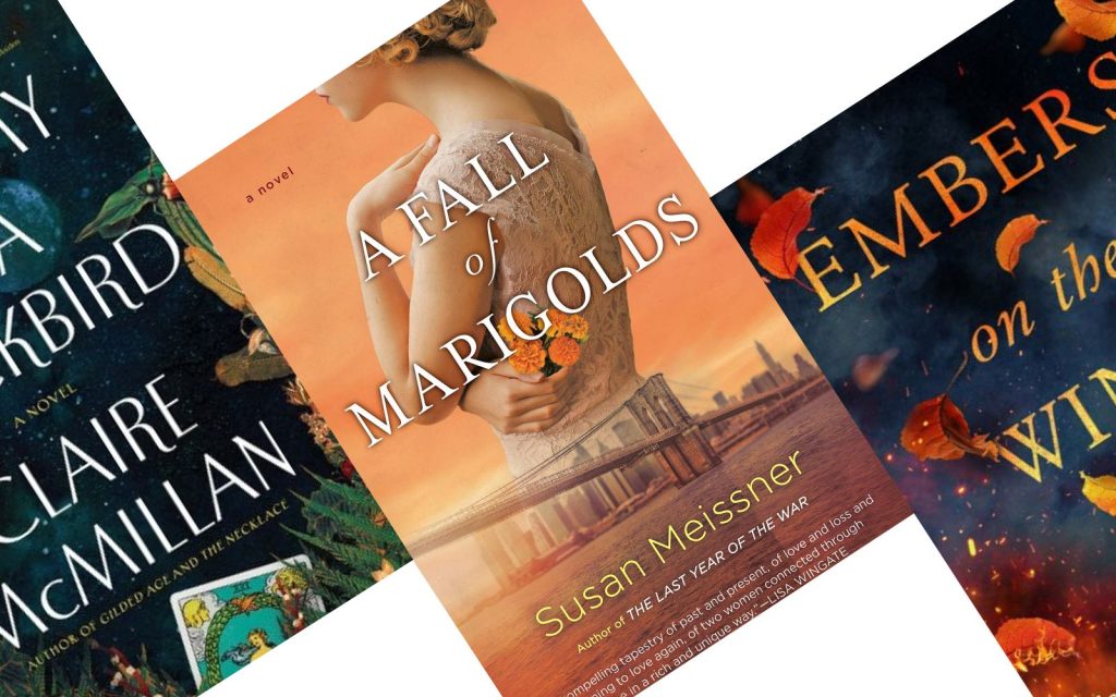 Three angled book covers in shades of orange. The center book is titled A Fall of Marigolds.