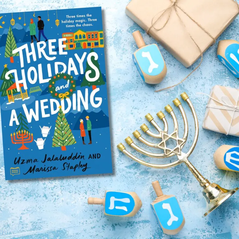 Book cover of Three Holidays and a Wedding on a light blue background surrounded by brown paper wrapped gifts, a menorah, and dreidel