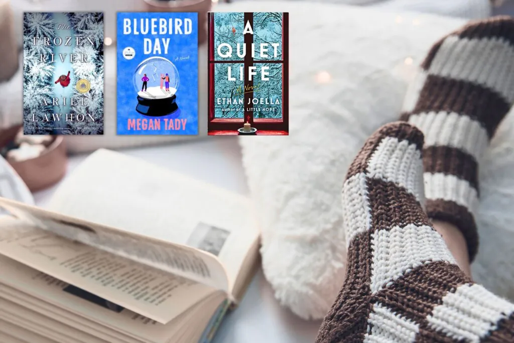 Cozy bed with socks and books