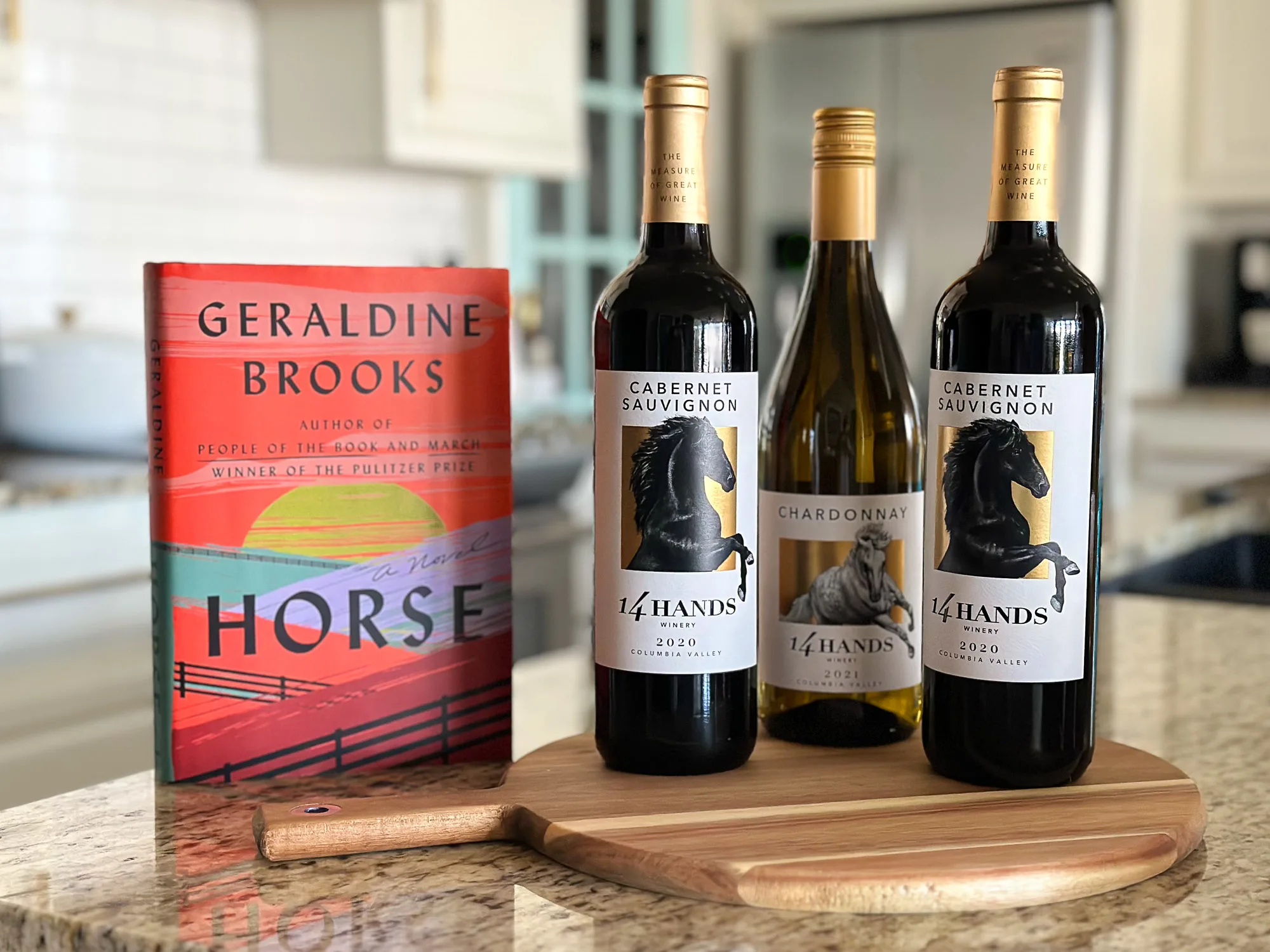 Horse book with three bottles of 14 hands wine