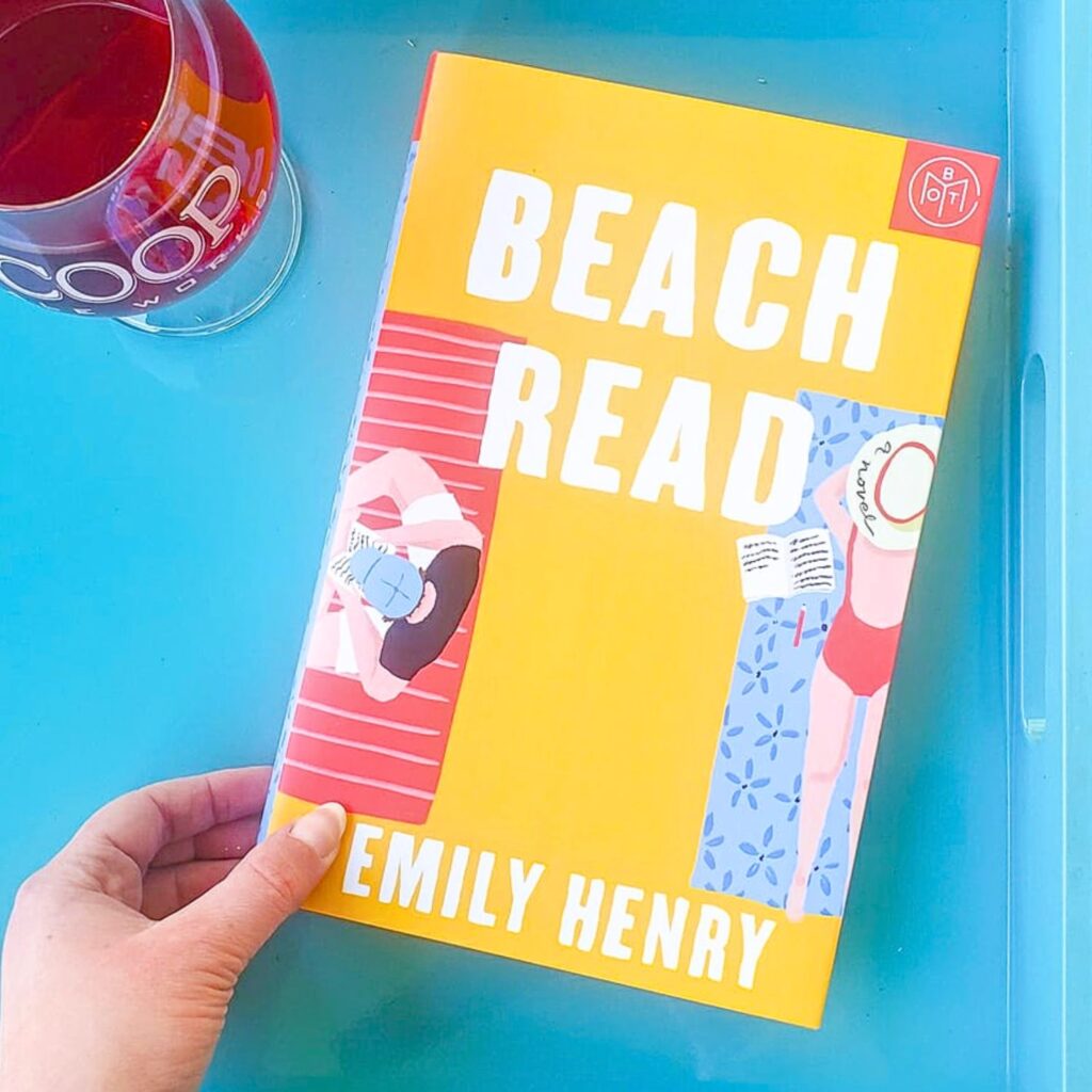 Yellow Beach Read book by Emily Henry on a blue tray