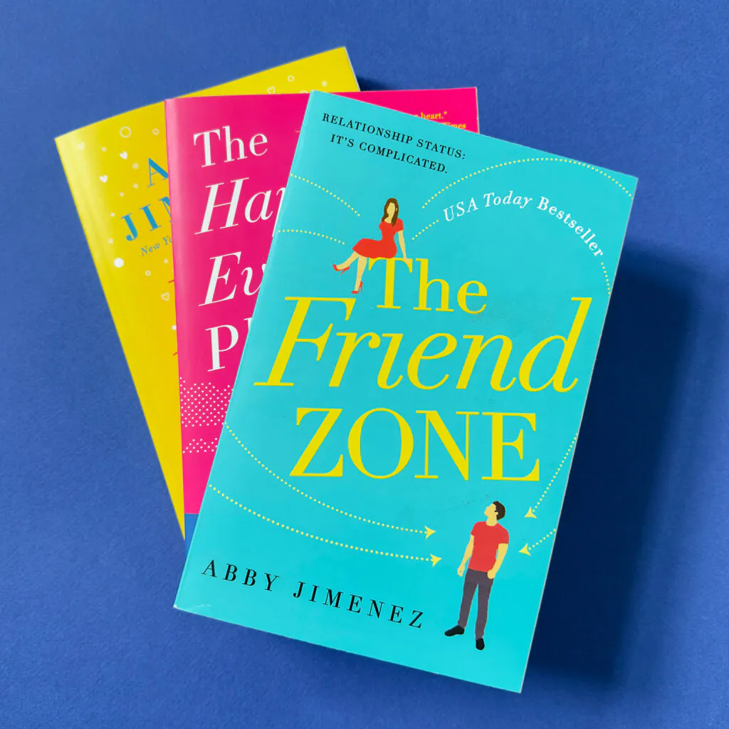 Three stacked books with The Friend Zone on top