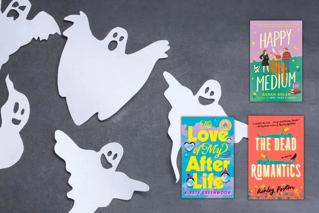 The ghost romance book covers on a dark background with white paper ghost cutouts on the left side