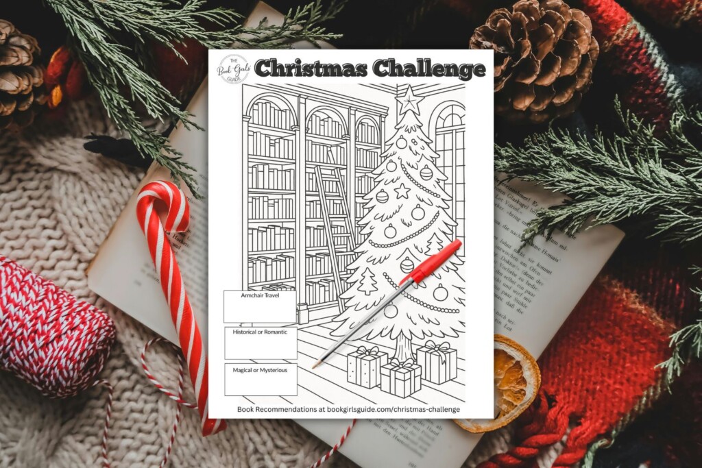 Christmas printable challenge tracker image over open book and christmas decor
