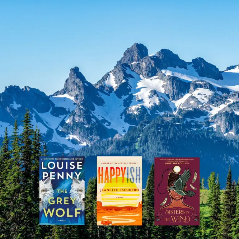 North American mountain range photo with three book covers on top