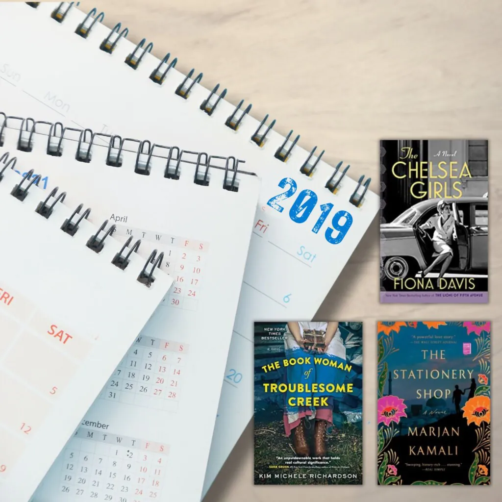 stack of 2019calendars and 3 book covers