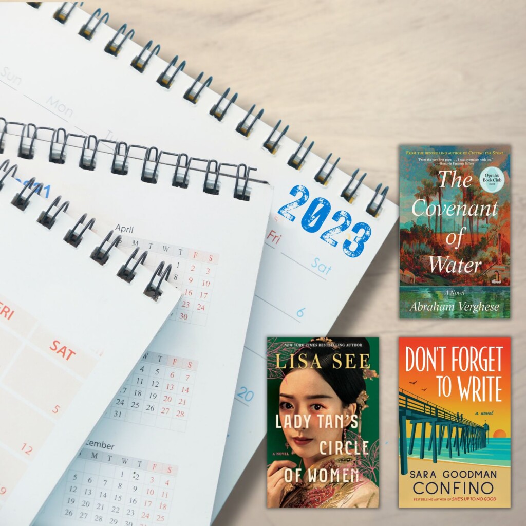 stack of calendars with one labeled 2013 and 3 book covers