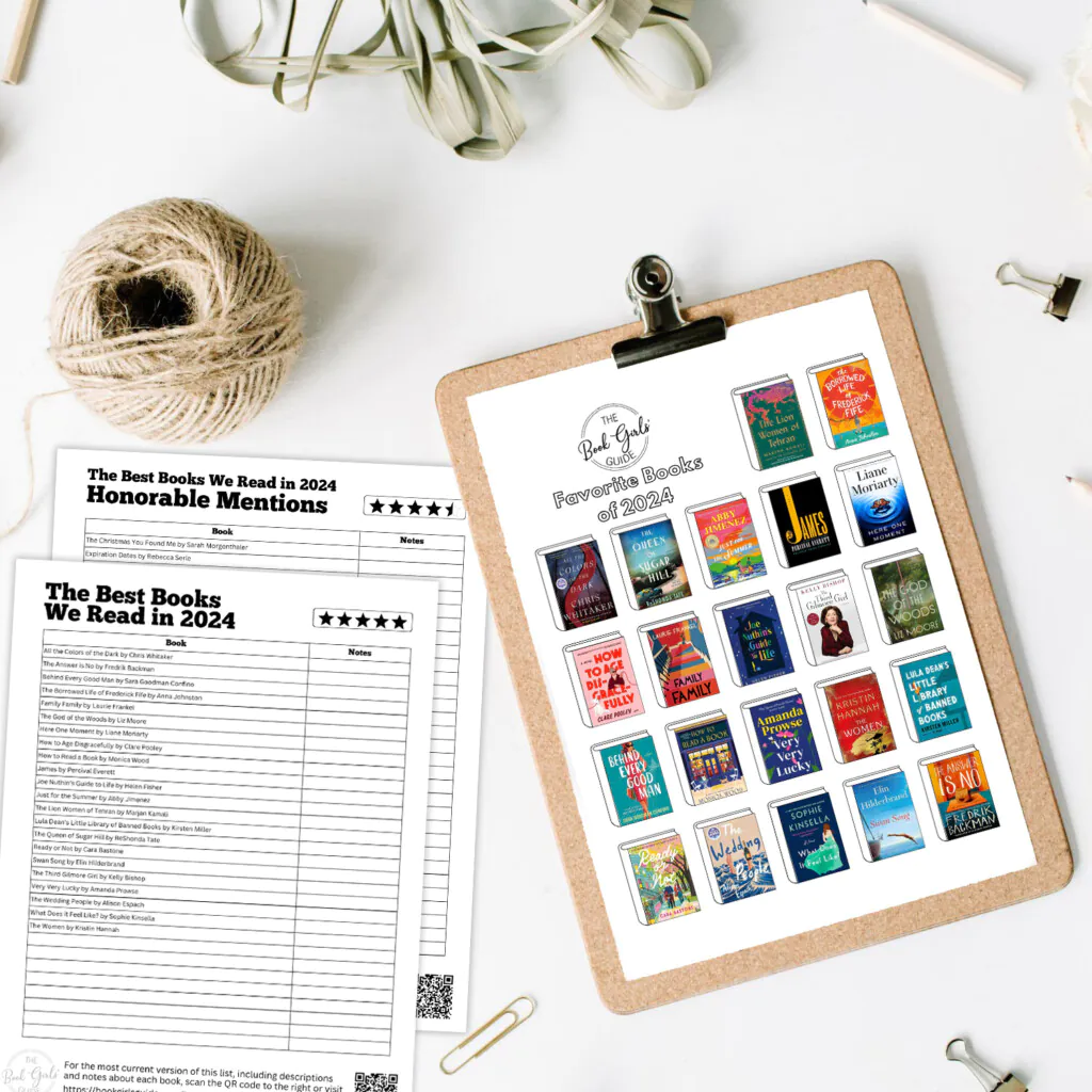 Clipboard on white desk with a paper filled with book covers of our favorite books published in 2024 and an additional printable list of only titles on the table next to the clipboard