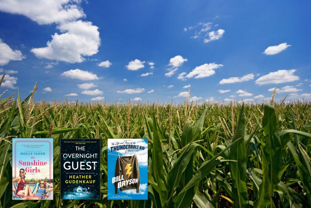 Photo of Iowa cornfields overlaid with three covers of books set in Iowa