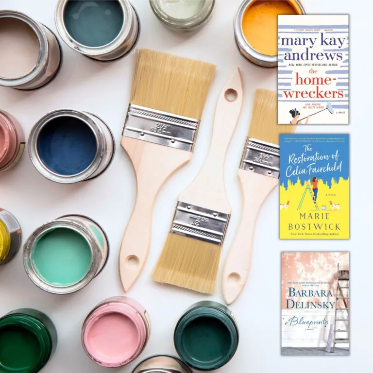 Photo of open paint cans and paint brushes with three covers of books about home renovation