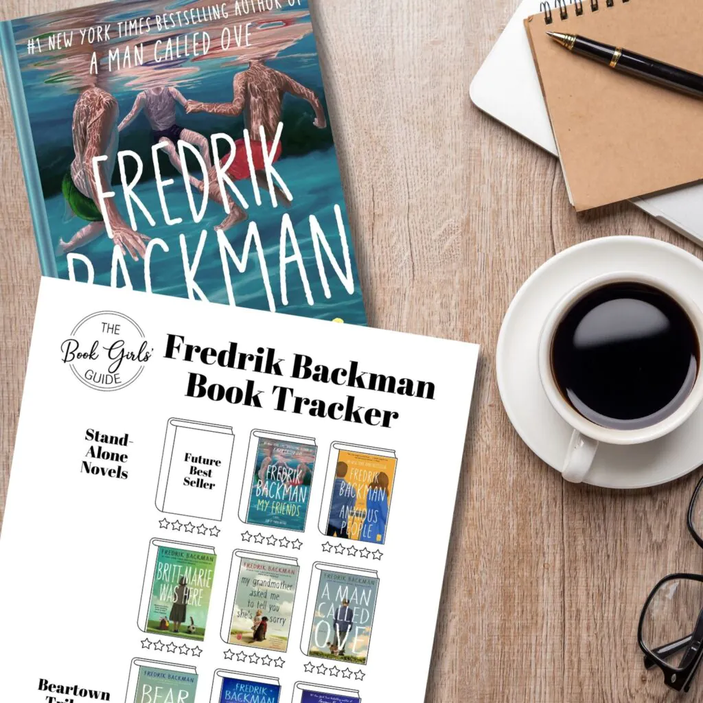 A light wood desktop wih a coffee cup, glasses, and a notebook on one side and a book and a printable list of Fredrik Backman books on the other side of the desk