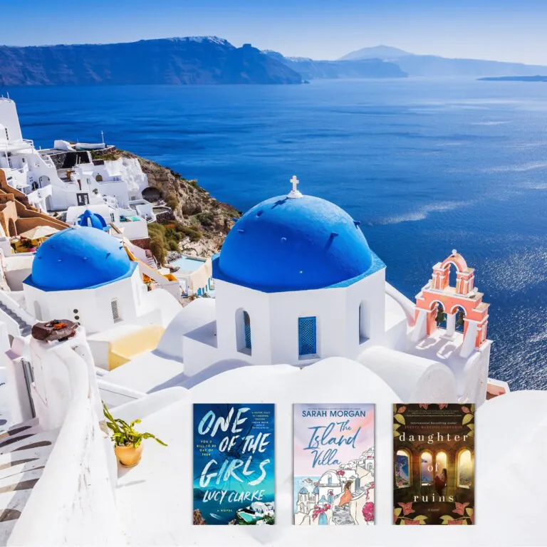 Photo of whitewashed buildings and blue domed churches in the town of Oia, Santorini overlooking the Aegean Sea with three covers of books set in the Greek Islands overlaid across the bottom of the photo