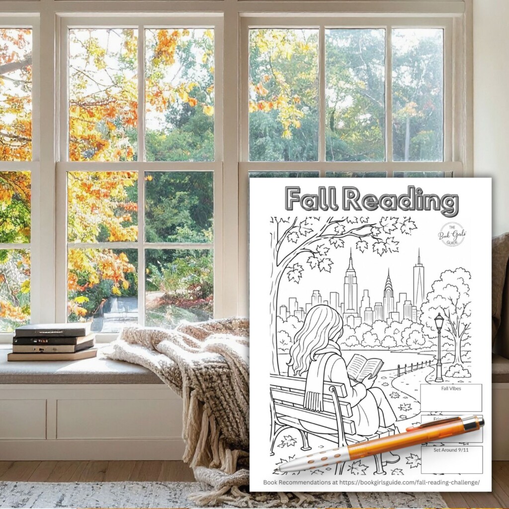 Books on window seat overlooking fall trees