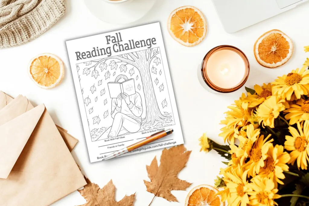 Fall leaves and flower in flatlay with fall reading challenge printable