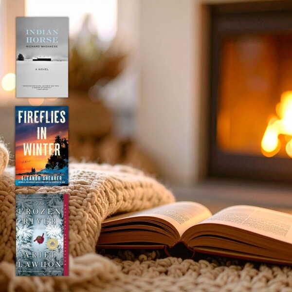 open book in front of fireplace with 3 book covers for winter book club books