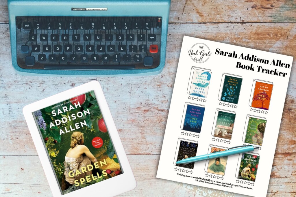 Paper with all of Sarah Addison Allen's book covers, Garden Spells cover on an ipad, and a teal typewriter