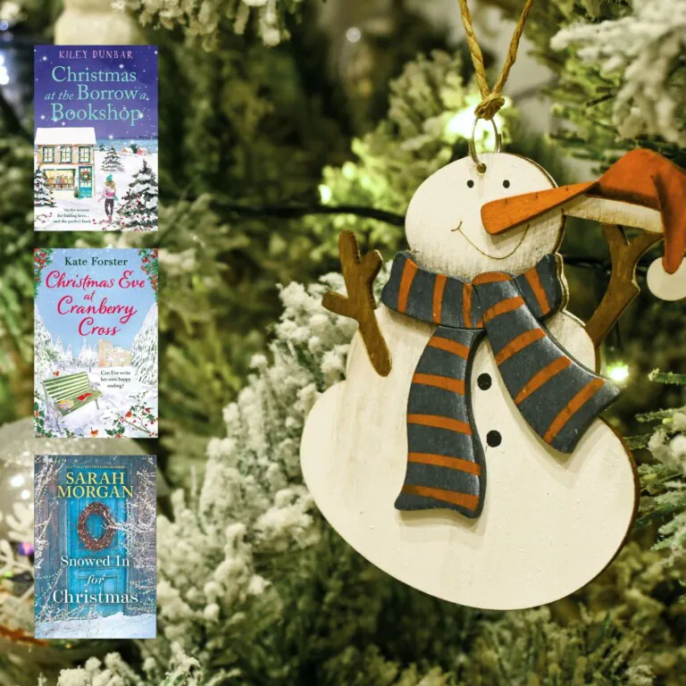 Snowman ornament in tree with three book covers