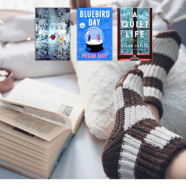 Cozy bed with socks and books