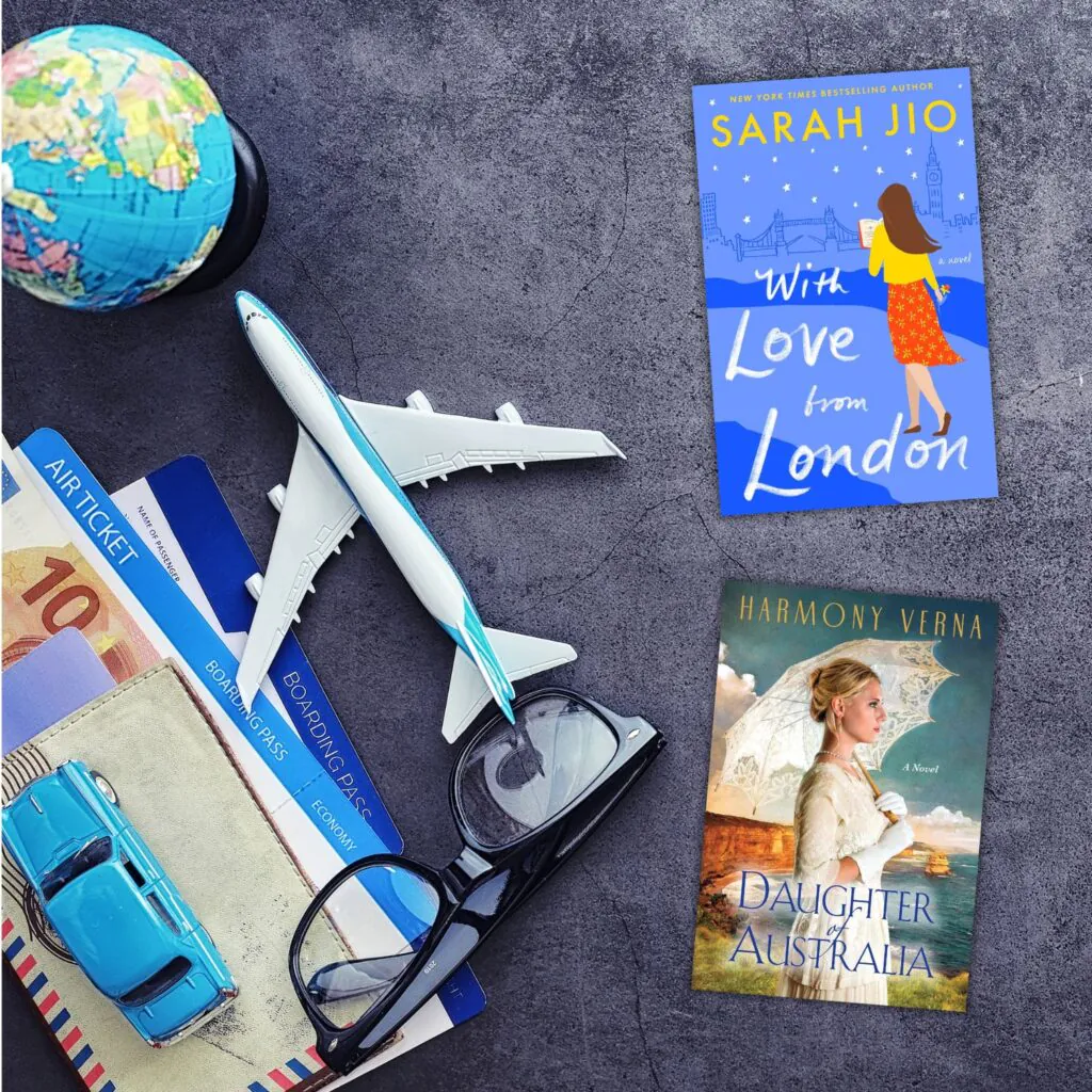 flatlay with two books, airplane, and globe