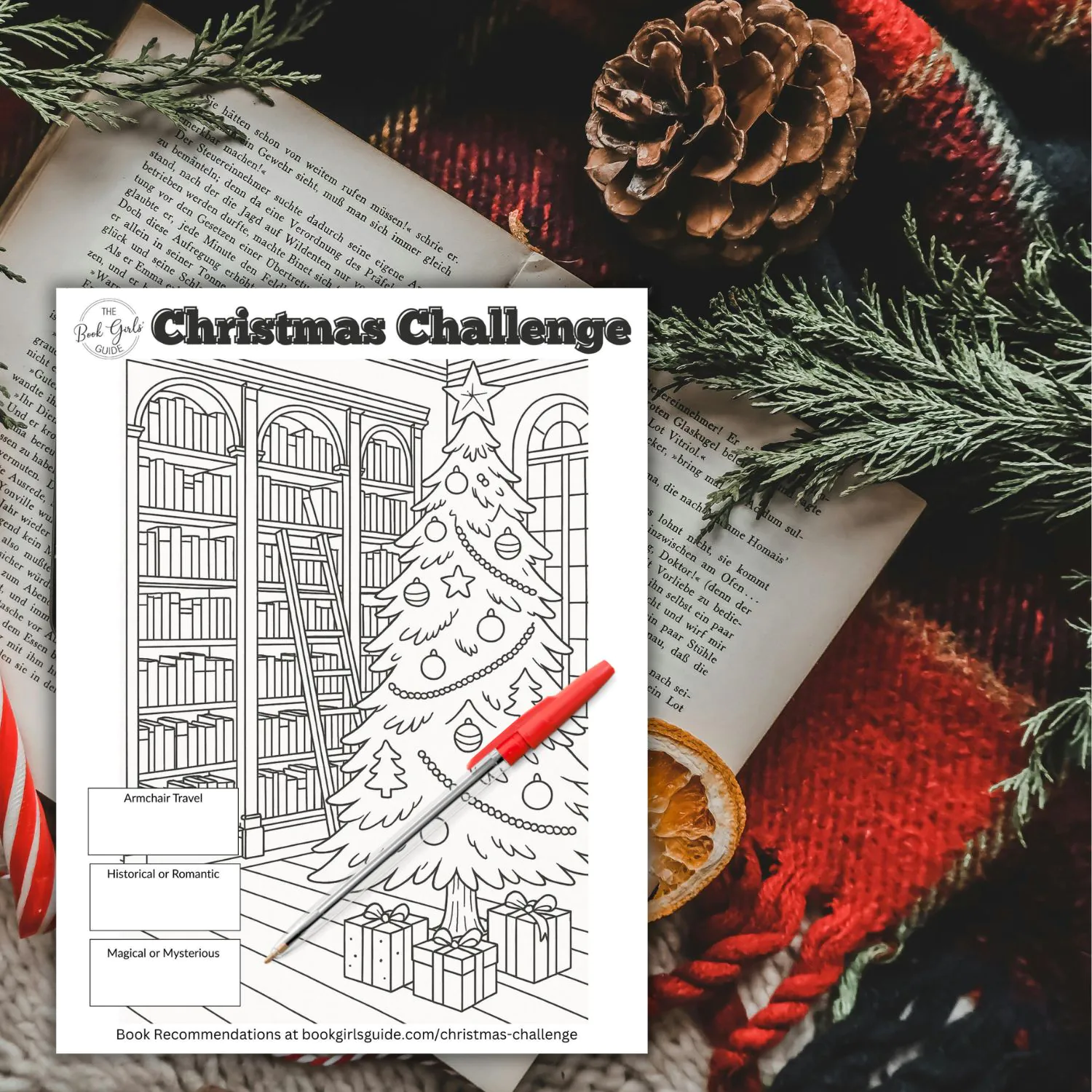Christmas printable challenge tracker image over open book and christmas decor