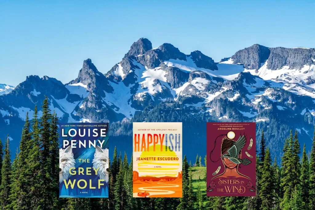 North American mountain range photo with three book covers on top