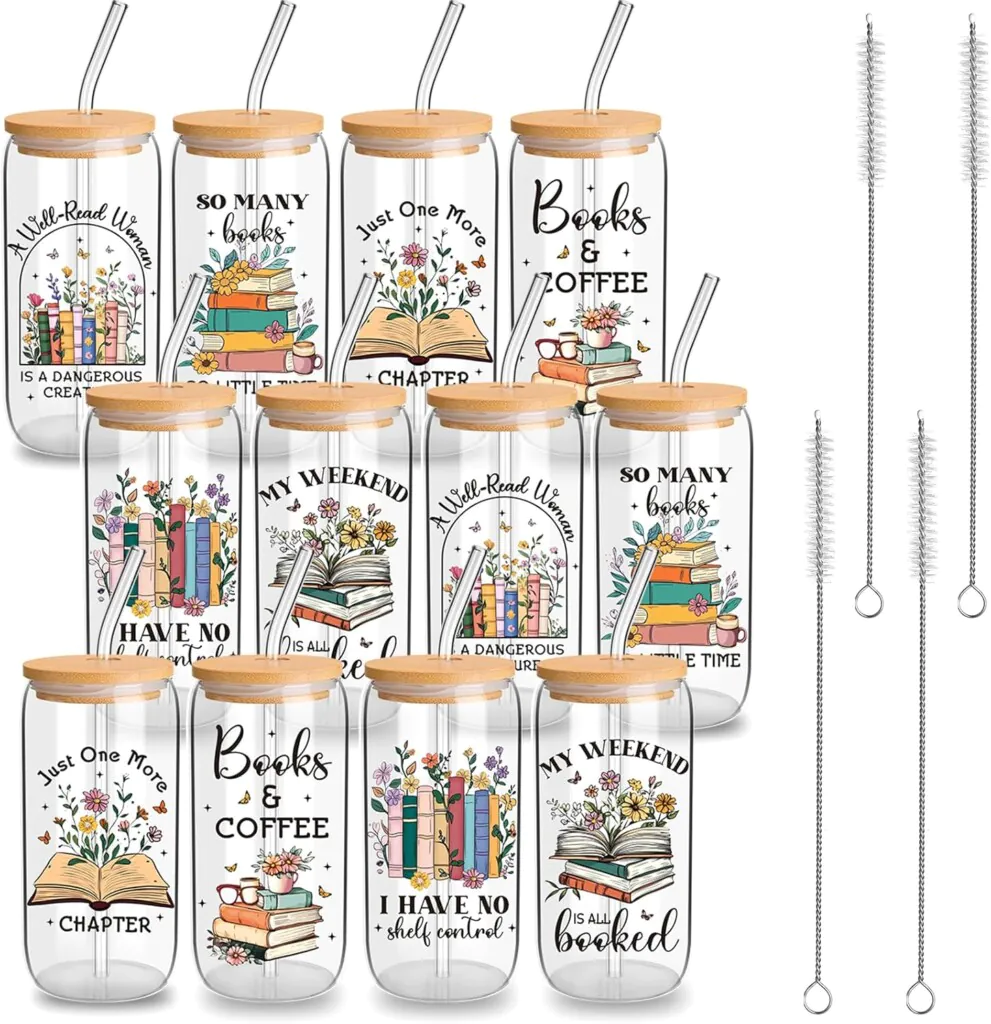 A dozen glass cups with lids and straws with a different bookish image on the front of each
