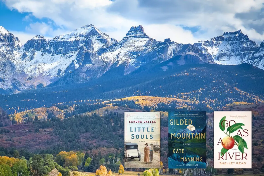 Photo of Colorado Mountains overlaid with three book covers