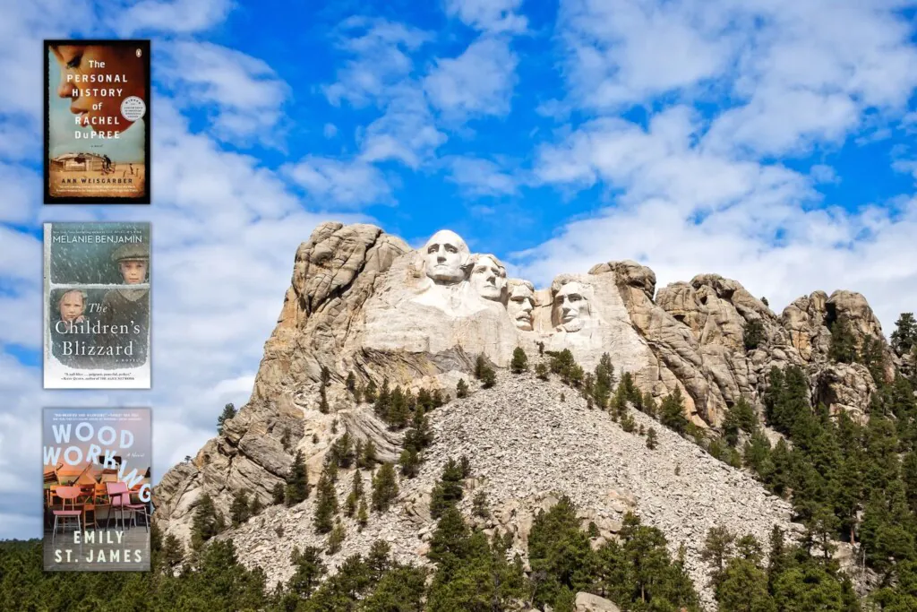 Mount Rushmore with 3 book covers