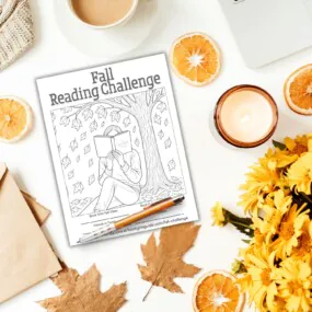 Fall leaves and flower in flatlay with fall reading challenge printable