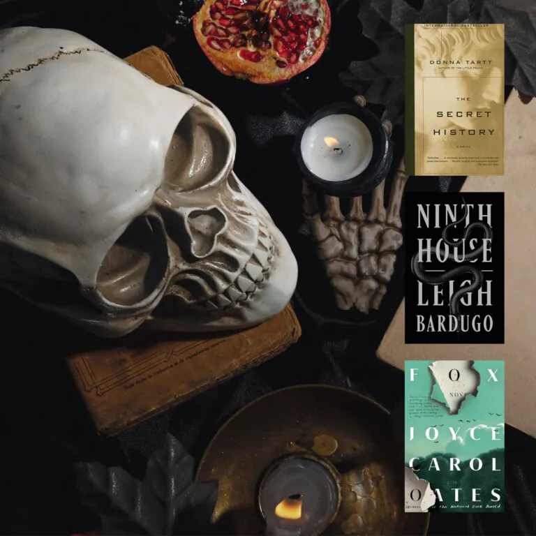 Flatlay image of old books, a skull, candles, and black leaves overlayed with three Dark Academia book covers